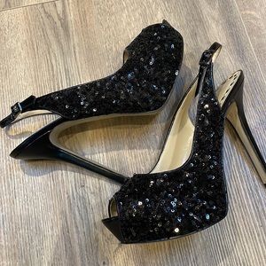 Sequin black platform heels.
